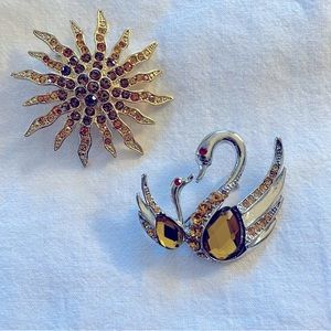 Two pretty Sun and swan rhinestone brooches